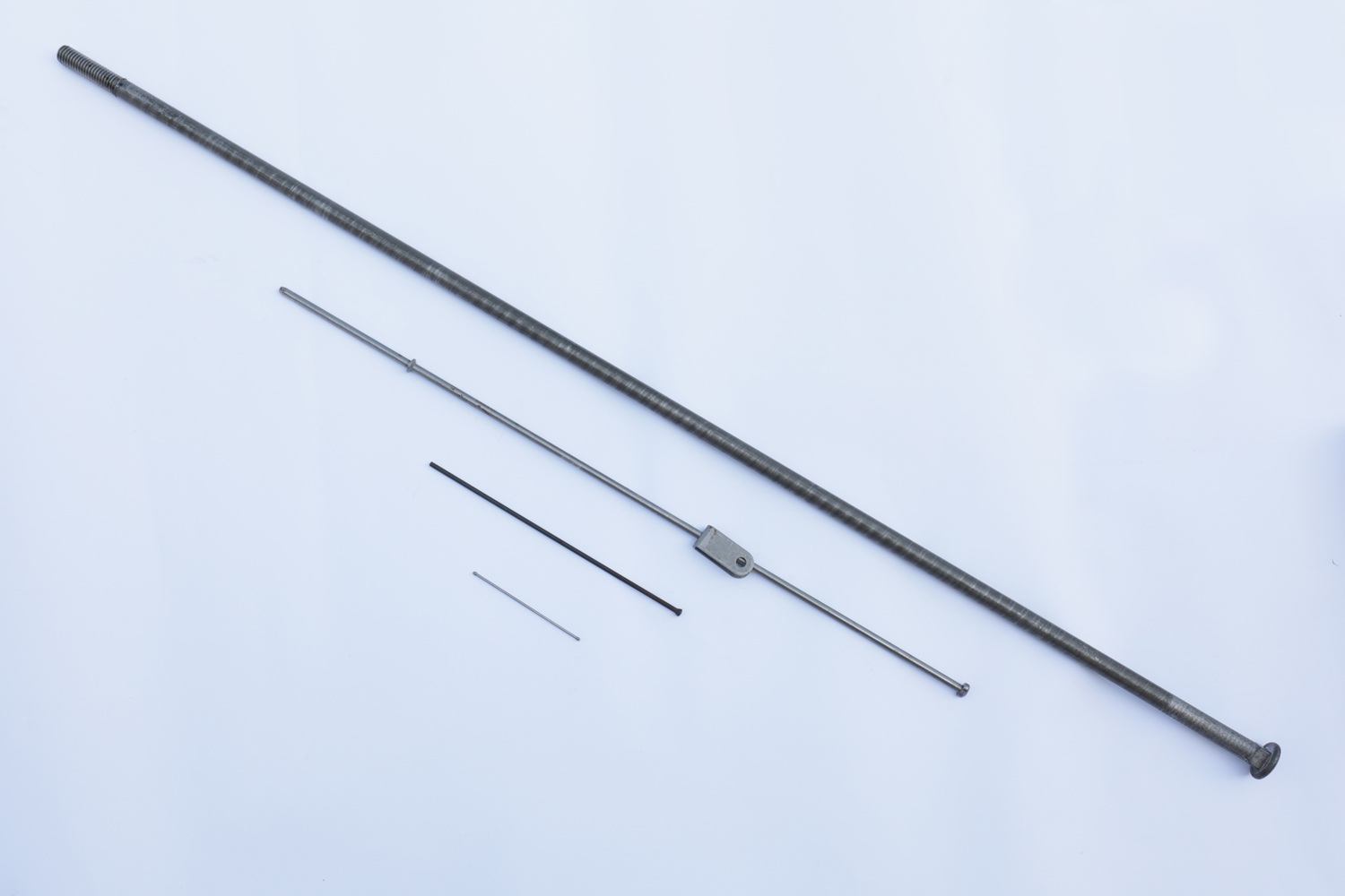 Metal rods in different lengths and diameters with threaded ends and formed features
